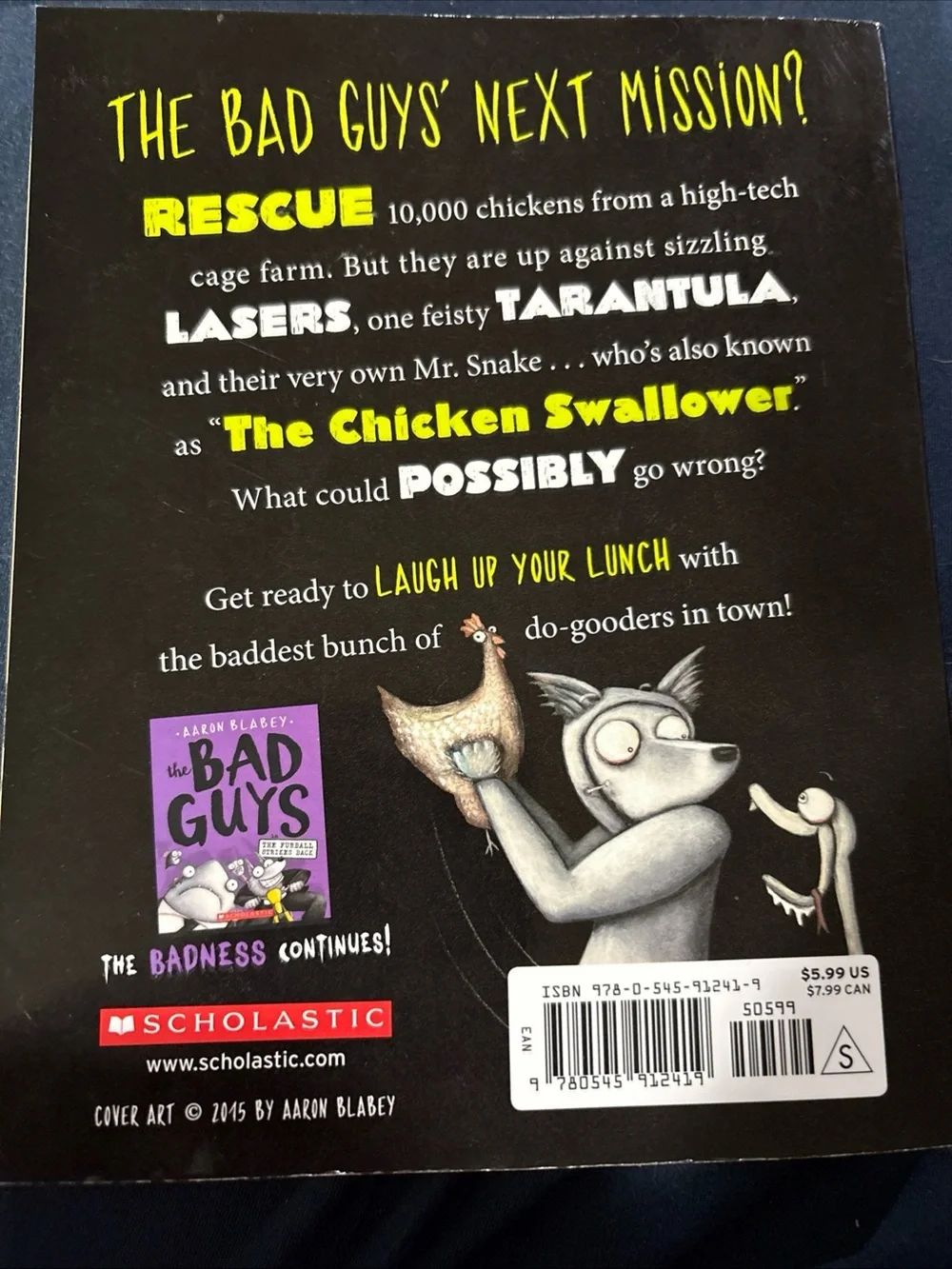 Scholastic Black Book Back Cover with Yellow and White Text